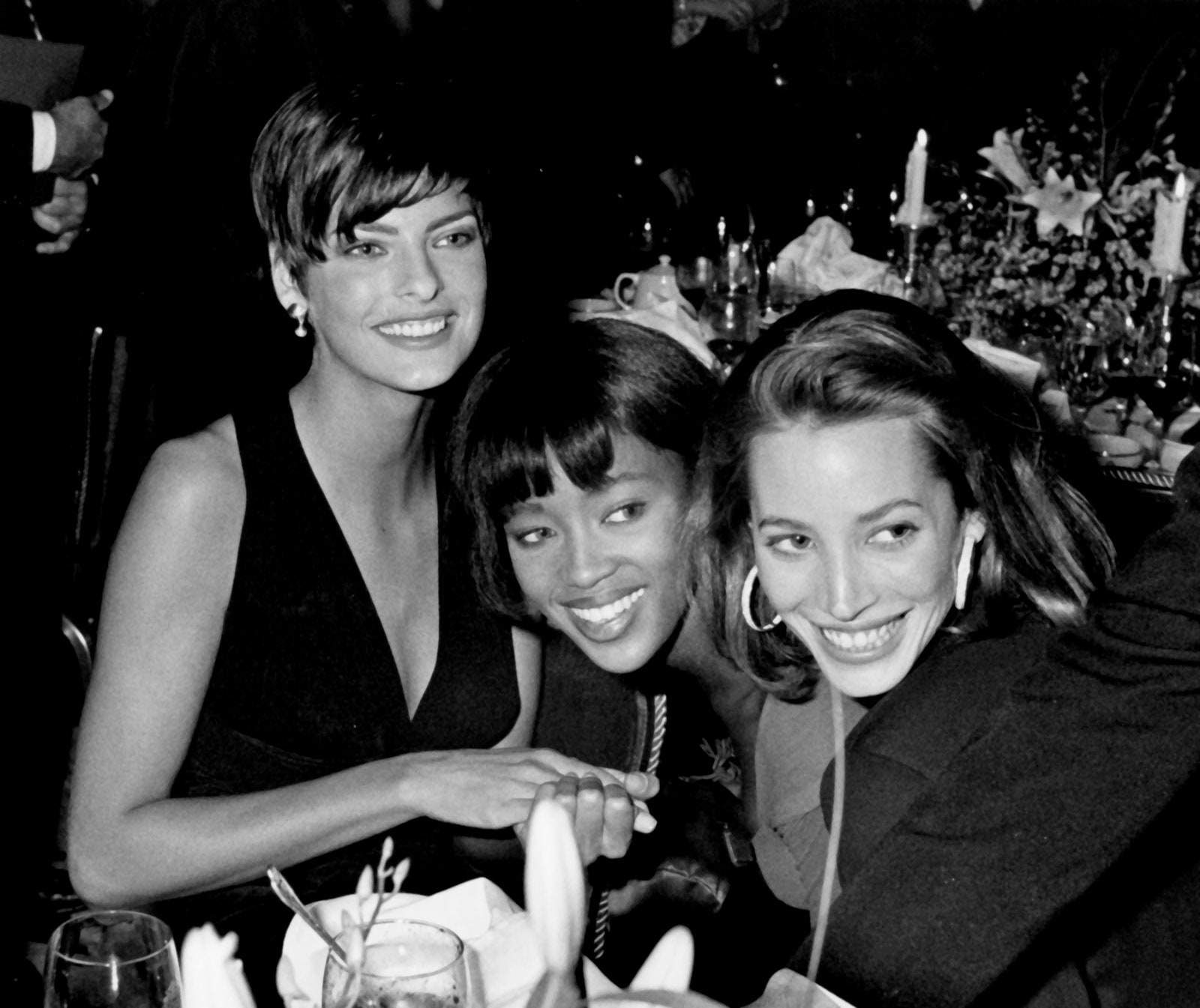 Images may contain Christy Turlington Naomi Campbell Linda Evangelista Cup Face Head Person Photography and Mortrait