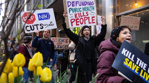 Demonstrators protest Trump administration on killing layoffs 