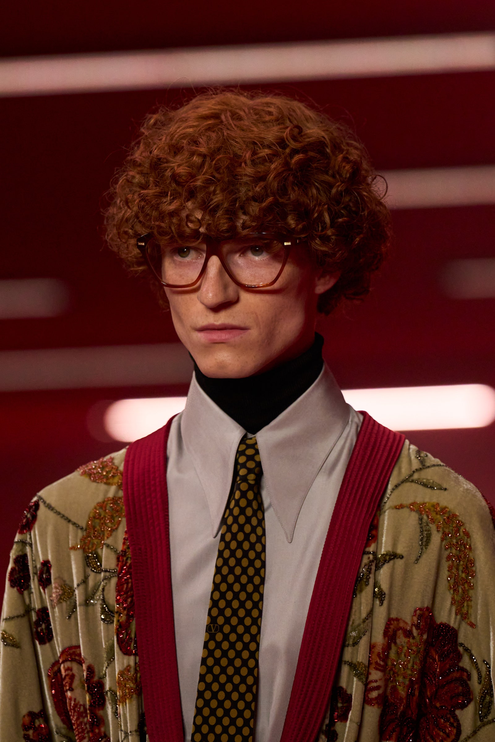 Images may contain Bill Milner accessories formally wearing electrical equipment microphone microphone fashion adult and human