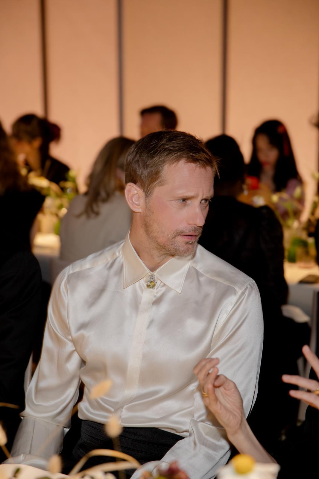 Images may contain Alexander Skarsgã¥RD clothing shirt adult body parts finger finger shirt and kids