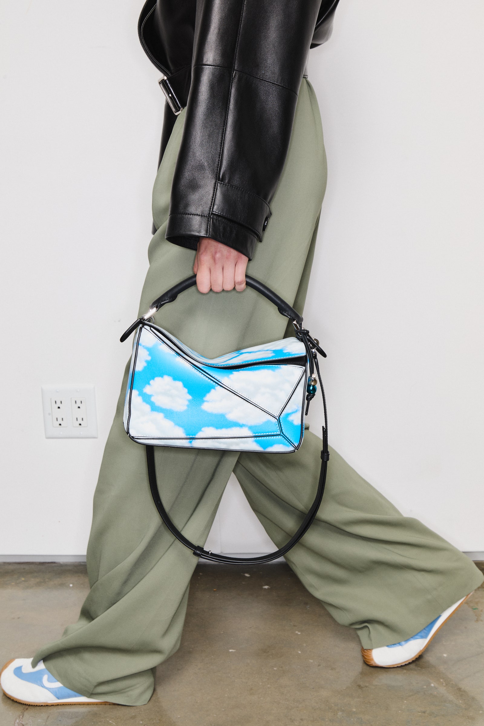 Images may contain accessories bags, handbags, purses, trousers, shoes and jackets