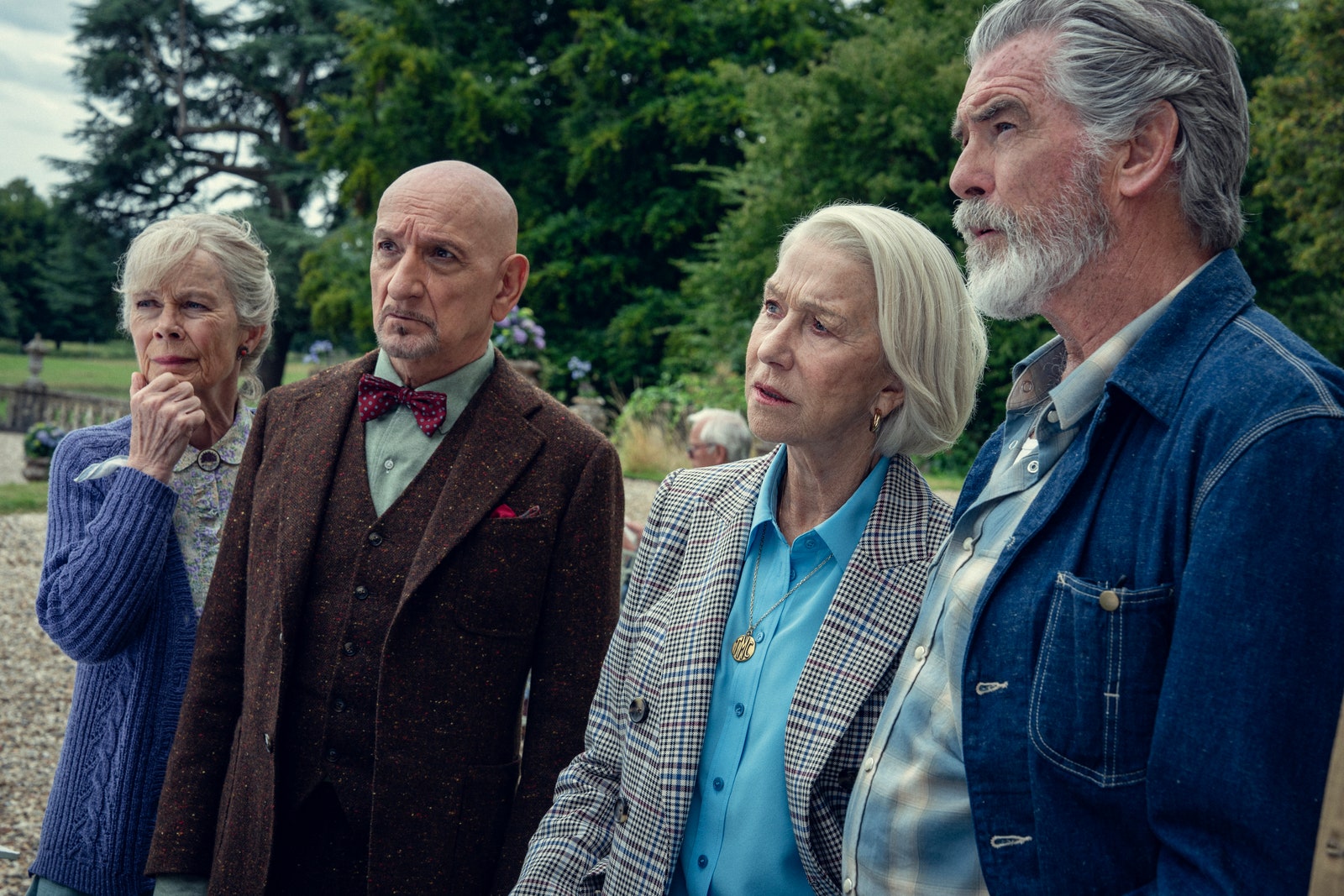 Images may contain the face and head of Pierce Brosnan Helen Mirren Ben Kingsley Celia Imrie Blazer Jacket