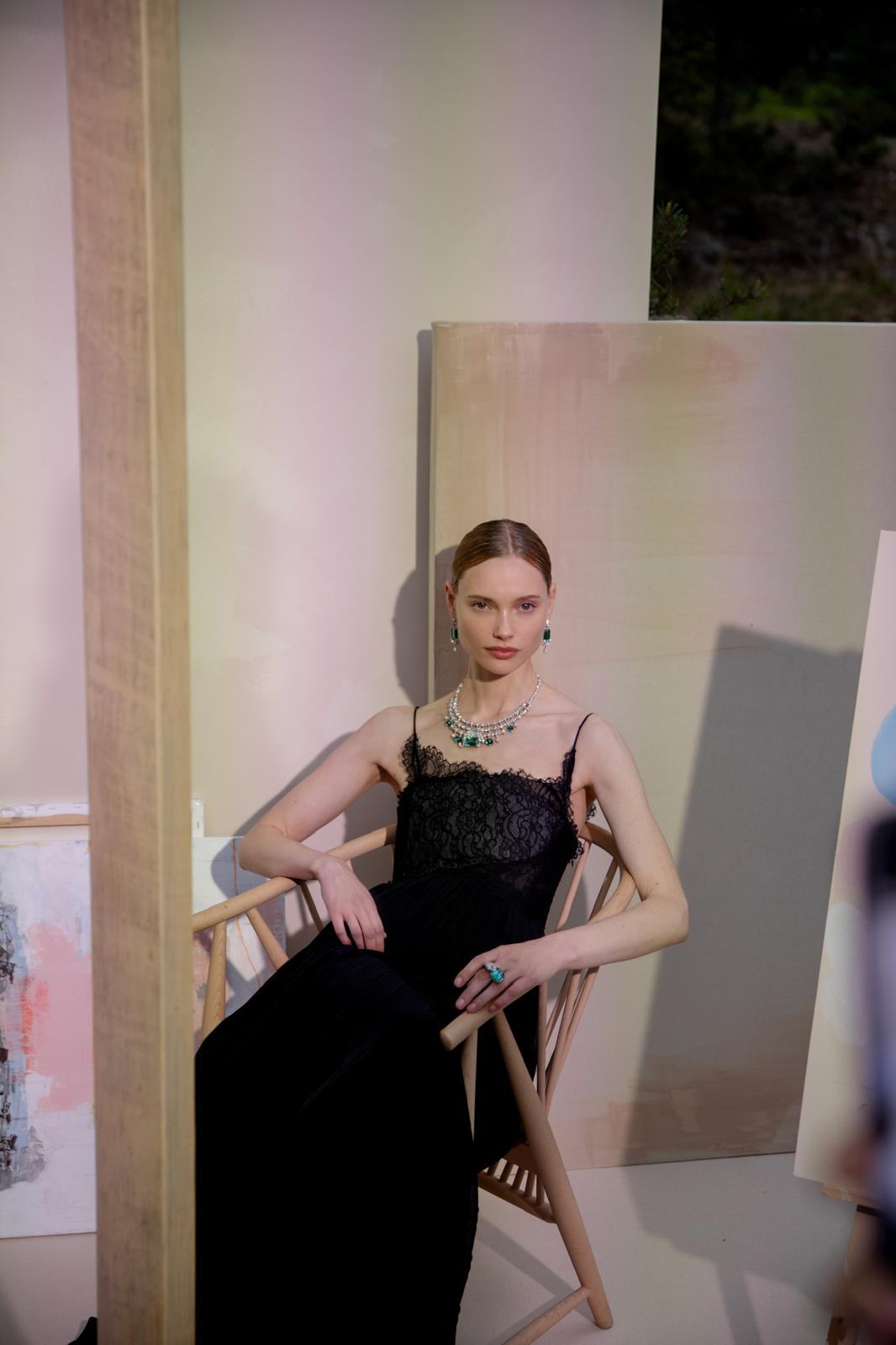 Images may contain Karmen Pedaru clothing gown evening dress formally wearing adult accessories and jewelry