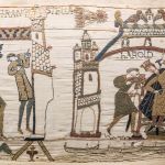 Part of the ancient tapestry shows the king and his slaves.