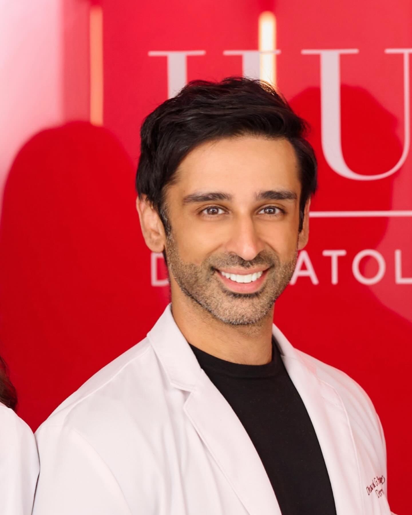 Image may contain Sami Khan head man's face DIMPLES adult happiness and smile