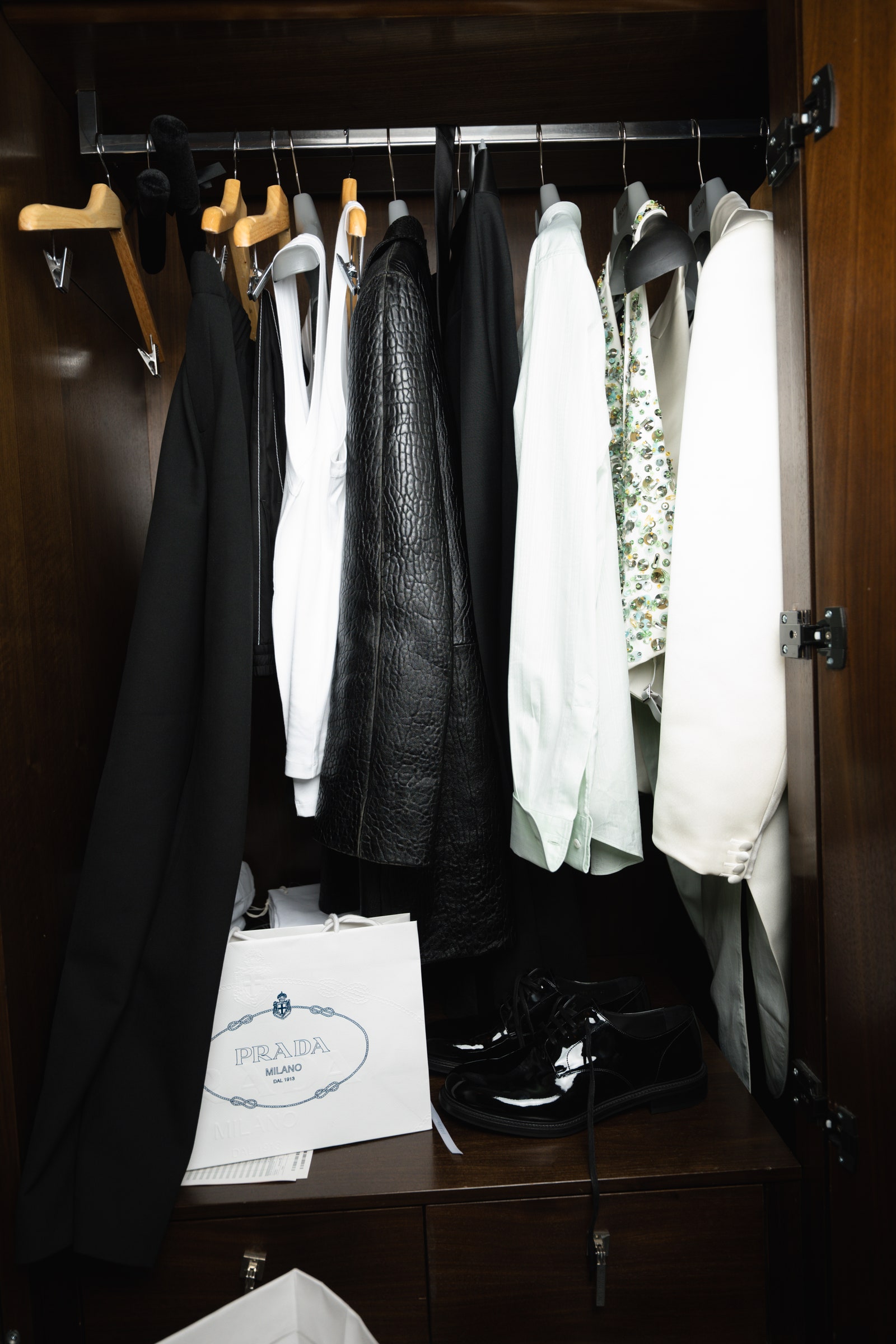 Images may contain furniture in the indoor dressing room room closet clothes and shoes