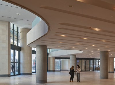 Two people in the atrium.