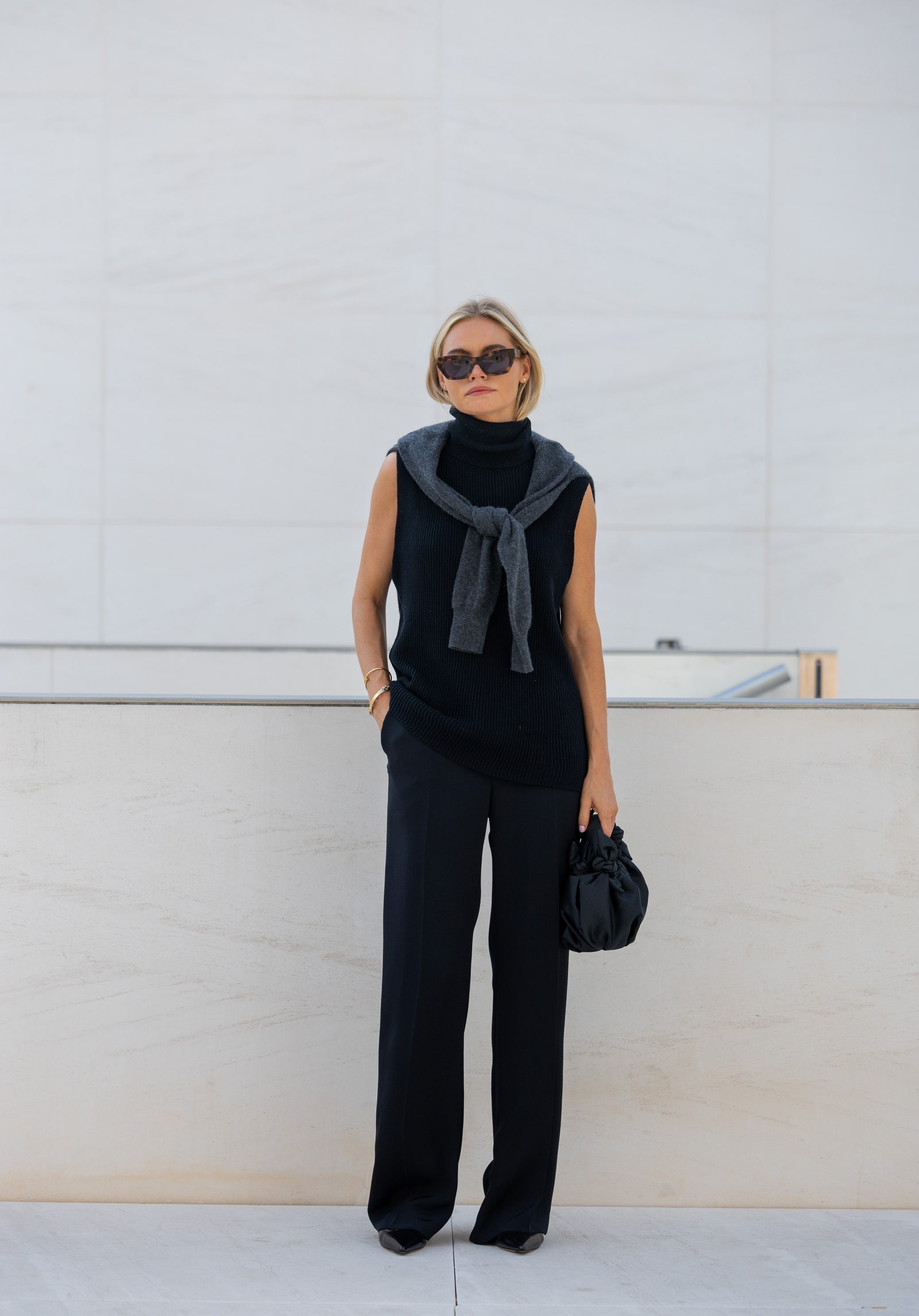 Images may contain clothing formally wearing suit shirt adult accessories handbag handbag glasses and dress