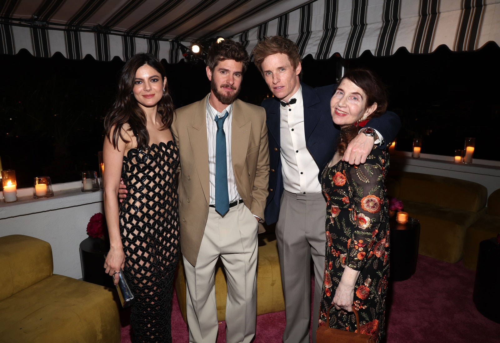 Images may contain Eddie Redmayne Monica Barbaro Andrew Garfield Fashion Jacket Clothing Jackets and Accessories
