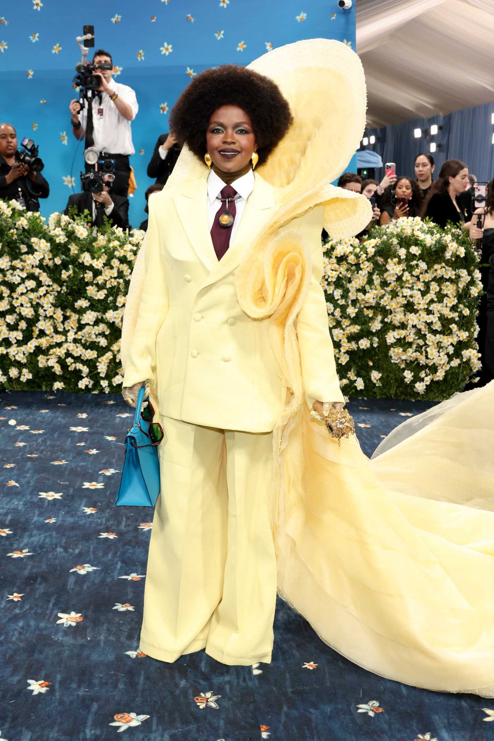 Images may contain Lauryn Hill Selina Gilsenan Shar Jackson Photography Accessories Handbags Formal Wear and Tie