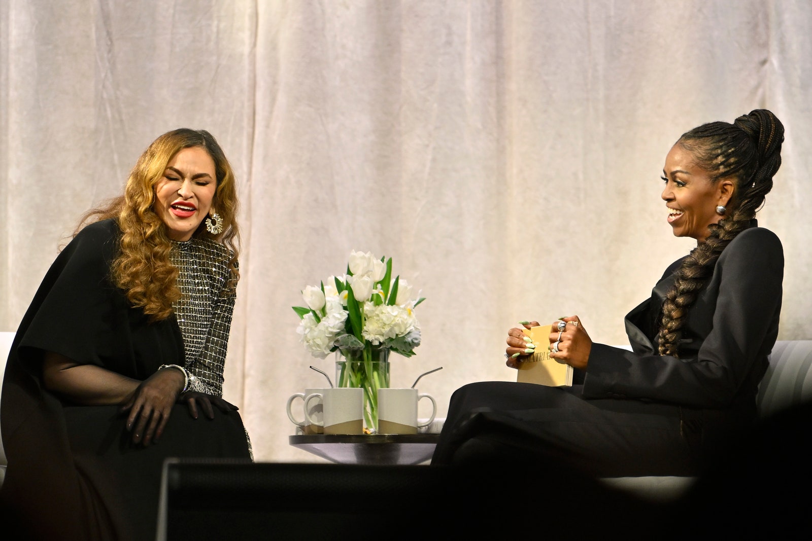 Images may contain Tina Knowles Michelle Obama Adult Cup Head-Faced Bracelet Jewelry and Joy