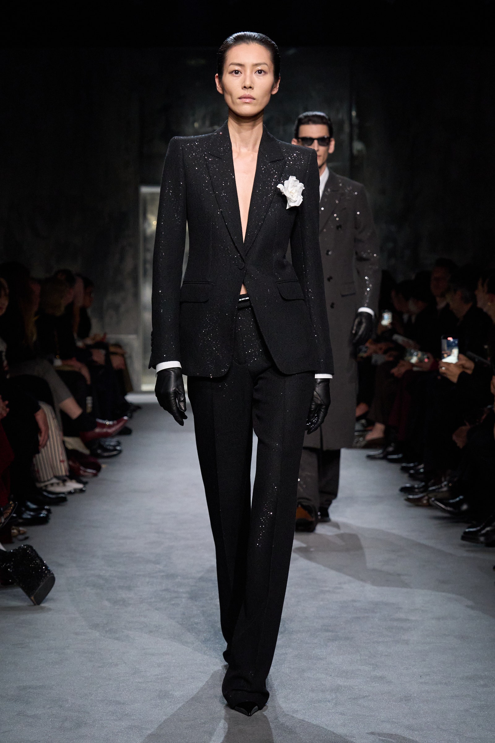 Images may contain Liu Wen Shaun Frank outfit formally wearing suits and fashionable gloves adult accessories and glasses