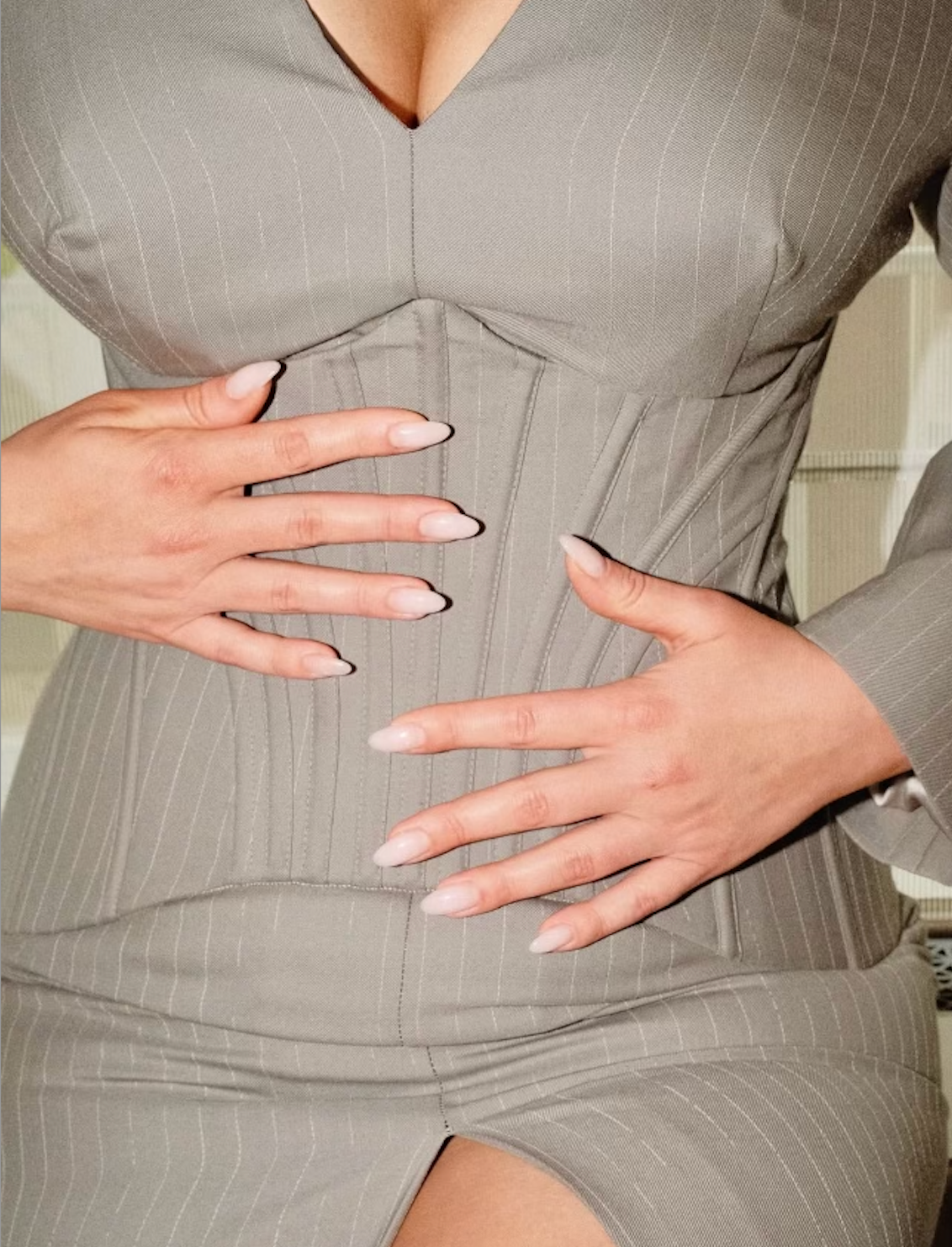 Images may contain clothes body parts fingers hand formally worn by adults and nails