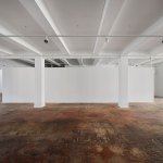 View of an empty gallery with empty picture board.