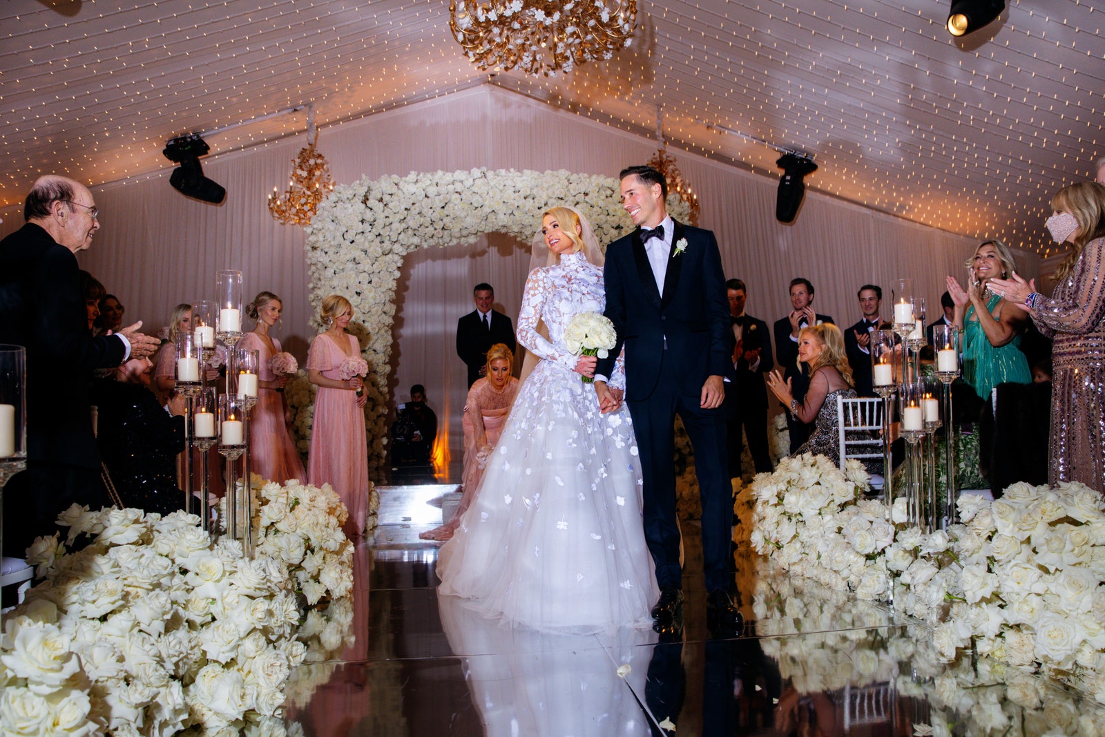 Image may contain Adult Person Wedding Accessories Formal Wear Tie Clothing Dress Fashion Gown and Wedding Gown