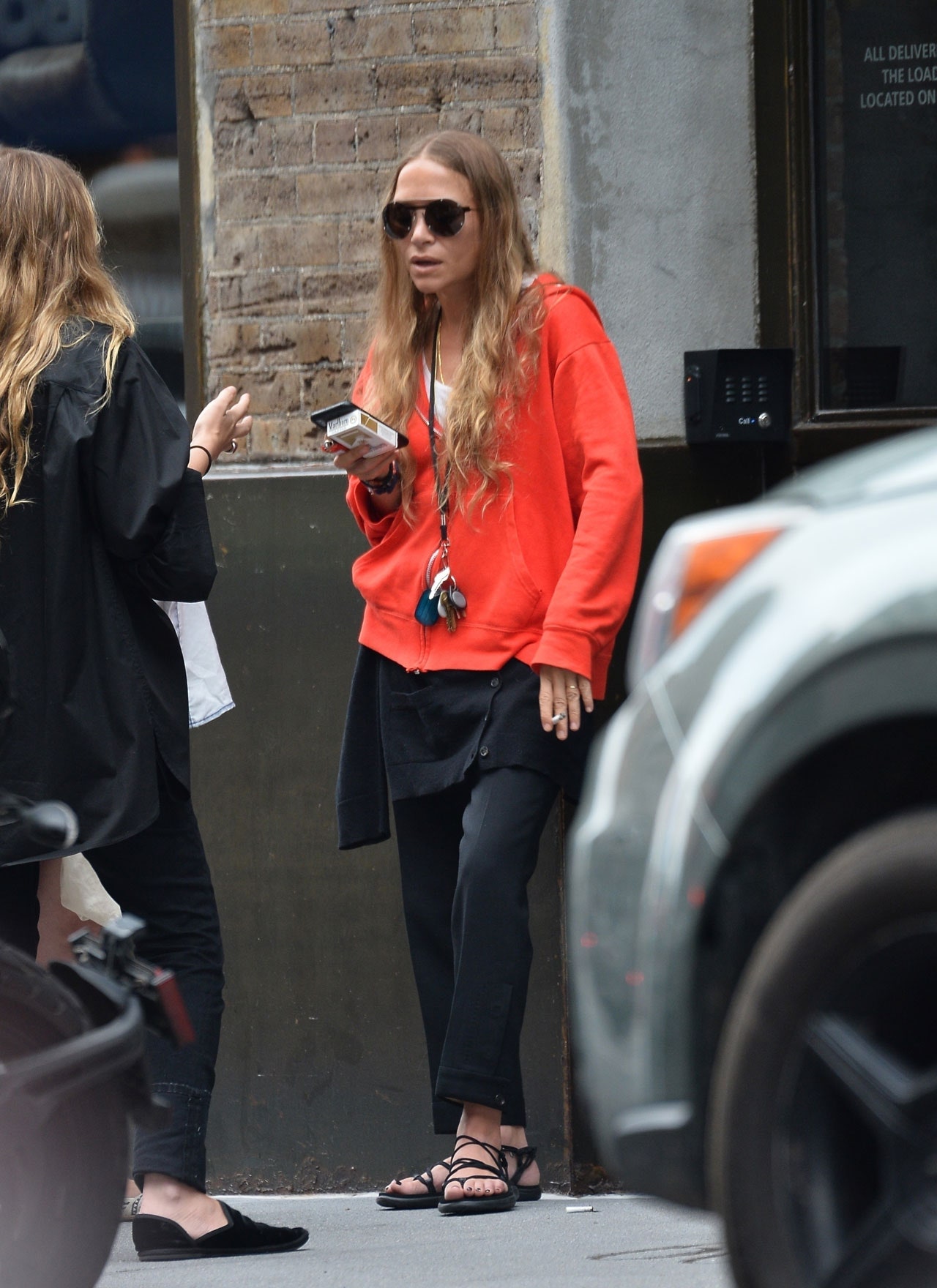 Images may contain Marykate Olsen clothing shoes shoes accessories adult sandals and head