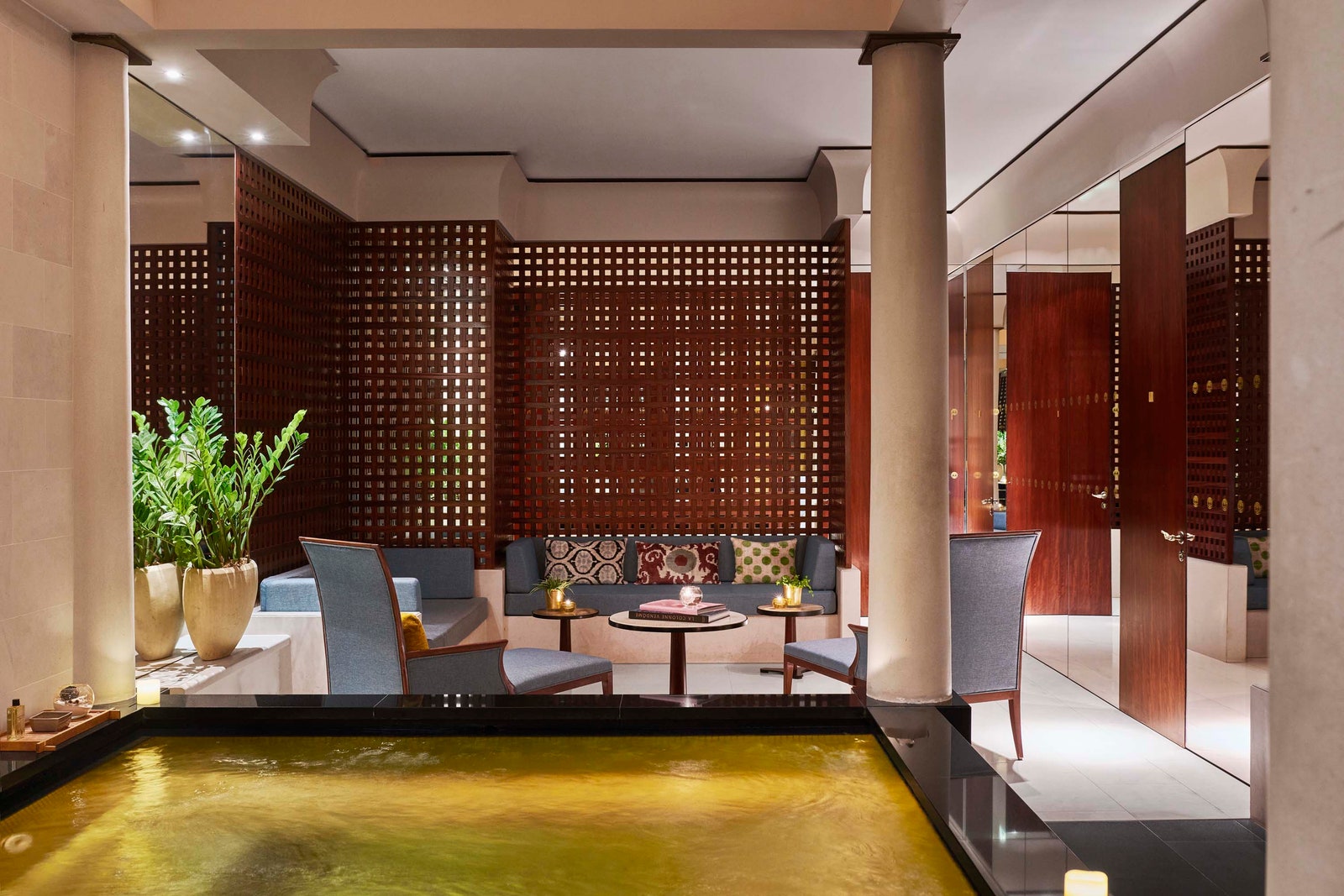 Images may contain interior design plants architecture hotel chairs furniture sofas and tables