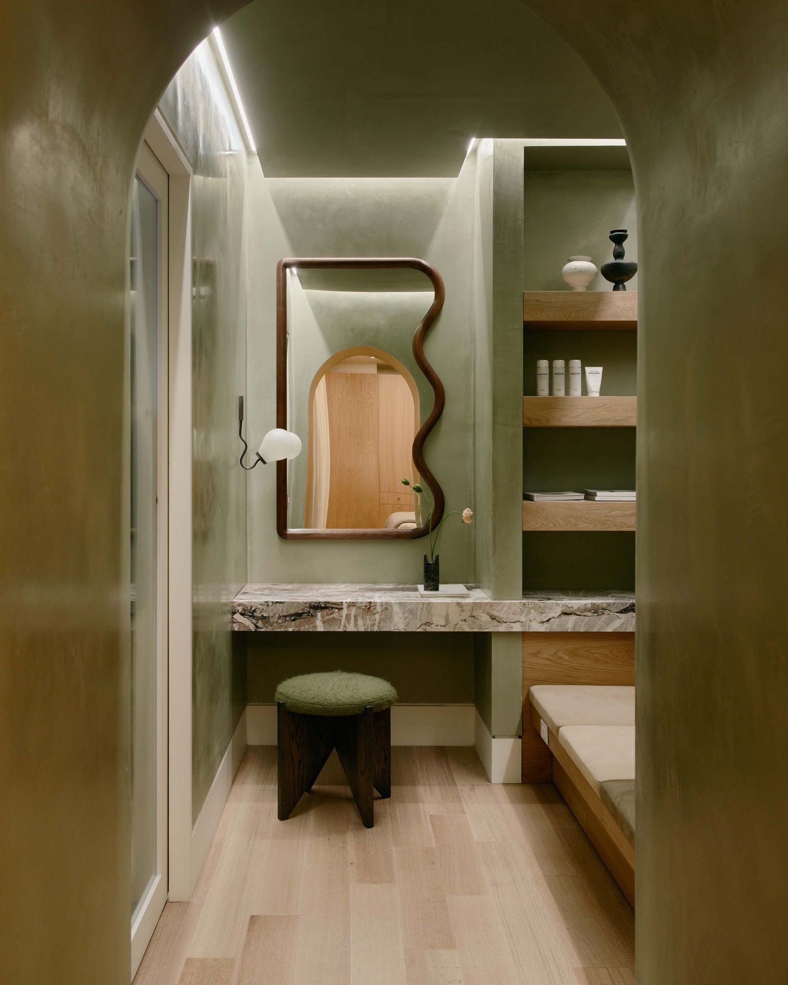 Images may contain interior design cup furniture locker room room wood and floor