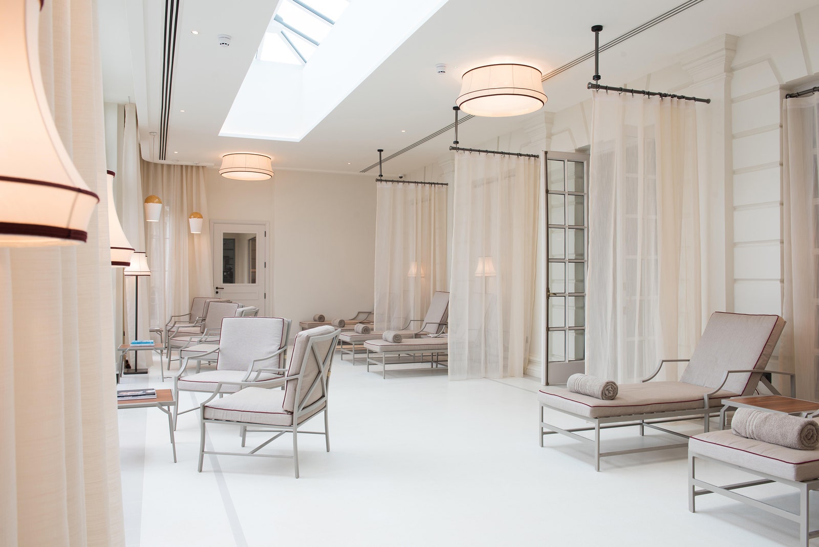 Images may contain light chair furniture in indoor reception room waiting room buildings and buildings