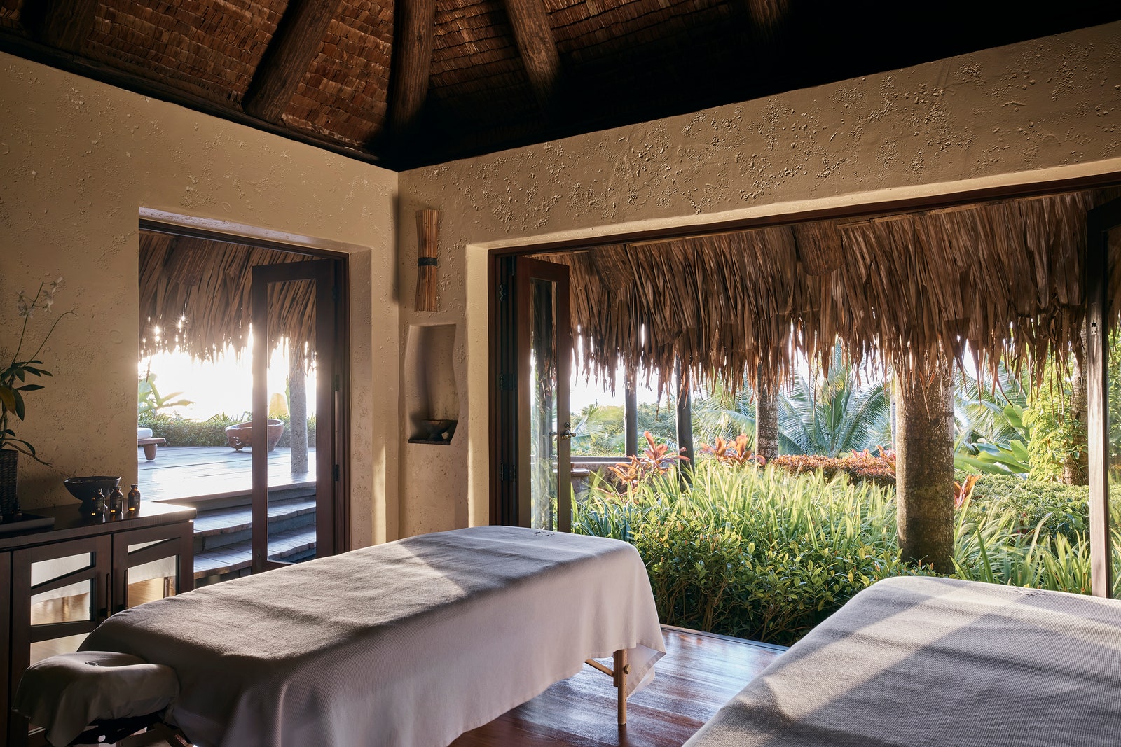 Images may contain architecture hotel resort plant bed furniture and spa
