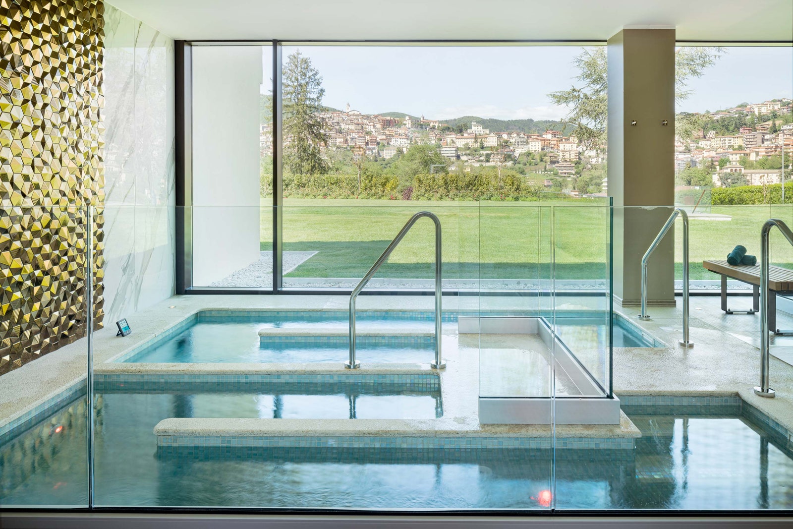 Images may contain swimming pool interior design swimming pool bathtub and bathing