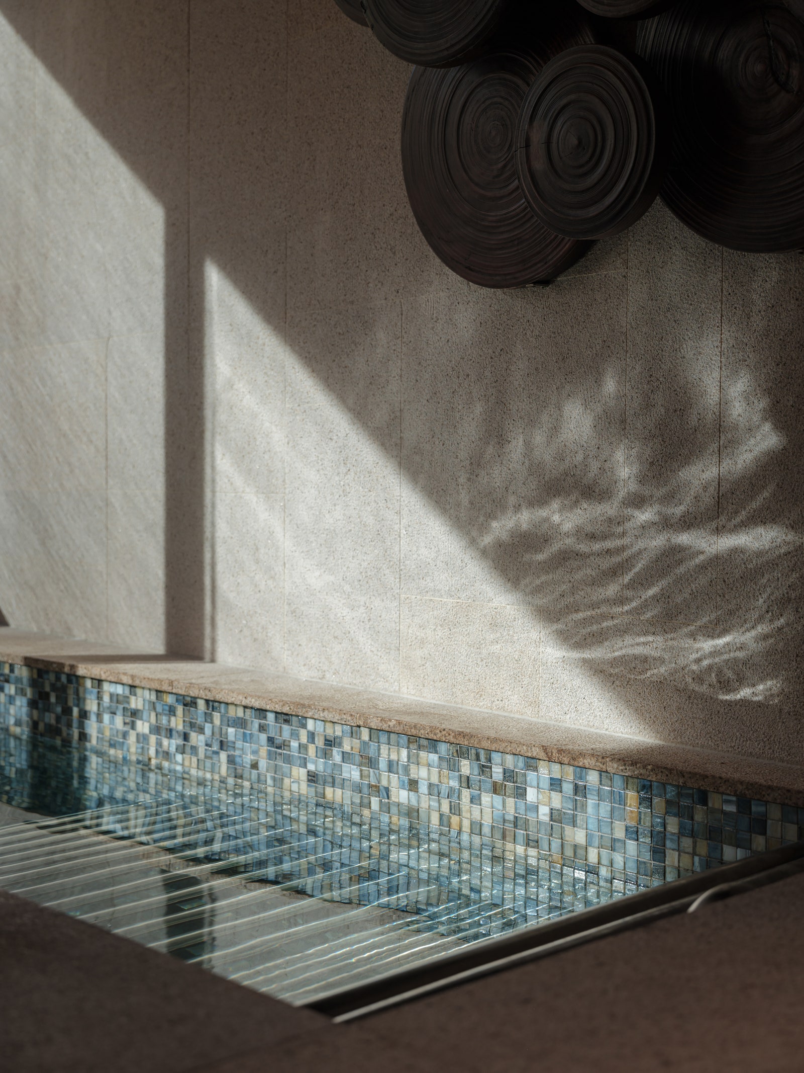 Images may contain interior design wheel pool water pool bathtub and ceramic tiles