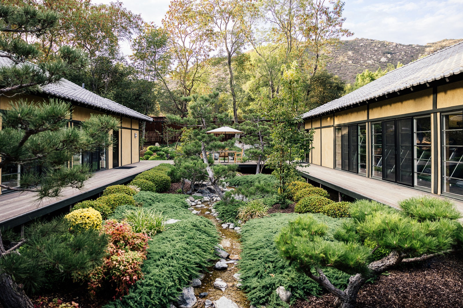 Images may contain architecture hotel resort garden nature outdoor cabin houses and plants