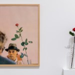 A rose next to a boat next to a white man next to a rose next to a boat next to a rose next to it.