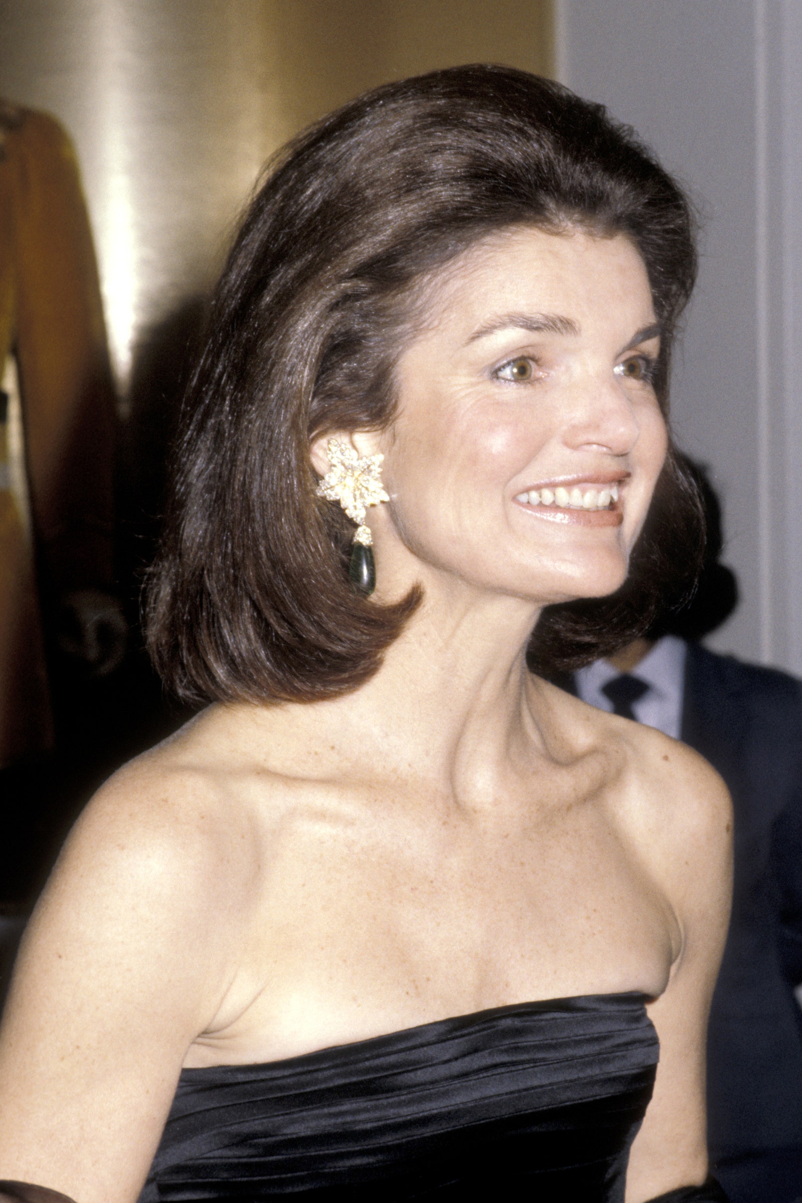 Images may contain Jacqueline Kennedy Onassis accessories earrings jewelry clothing face and person
