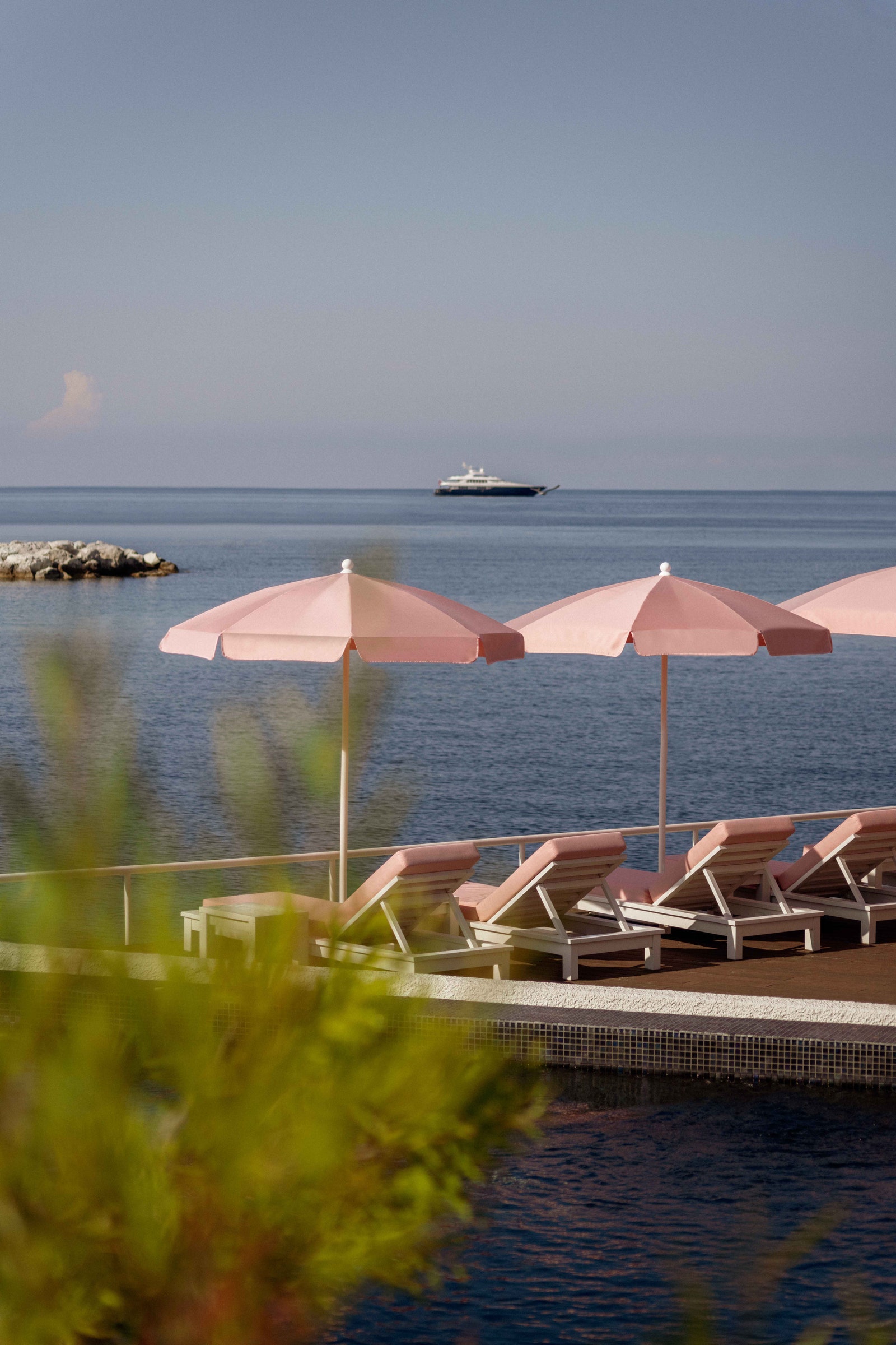 Images may contain seaside transport vehicles yachts nature in outdoor landscape boat chairs and furniture