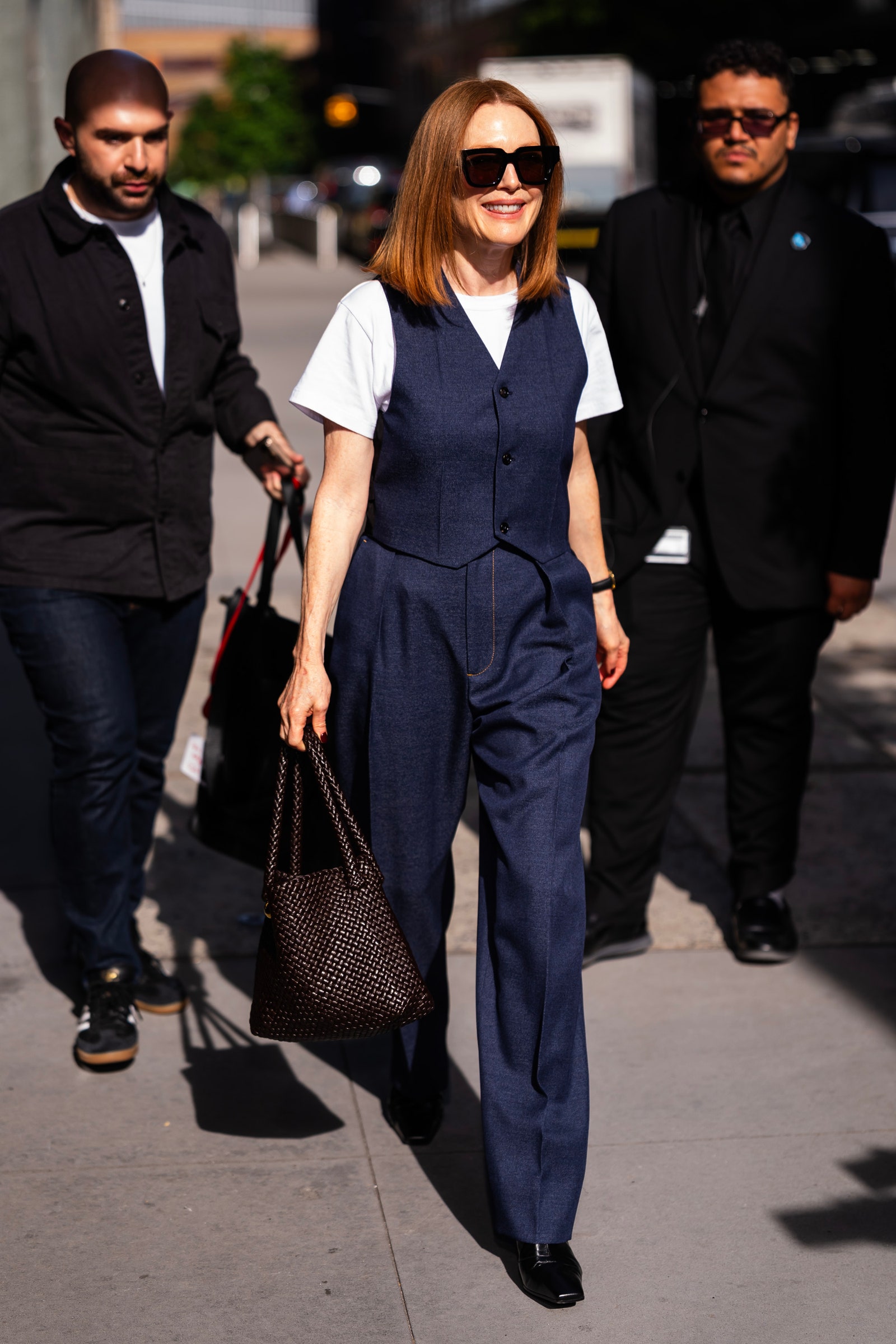 Images may contain Julianne Moore Accessories Bags Handbags Clothing Shoes Shoes Pants Adults and Formals