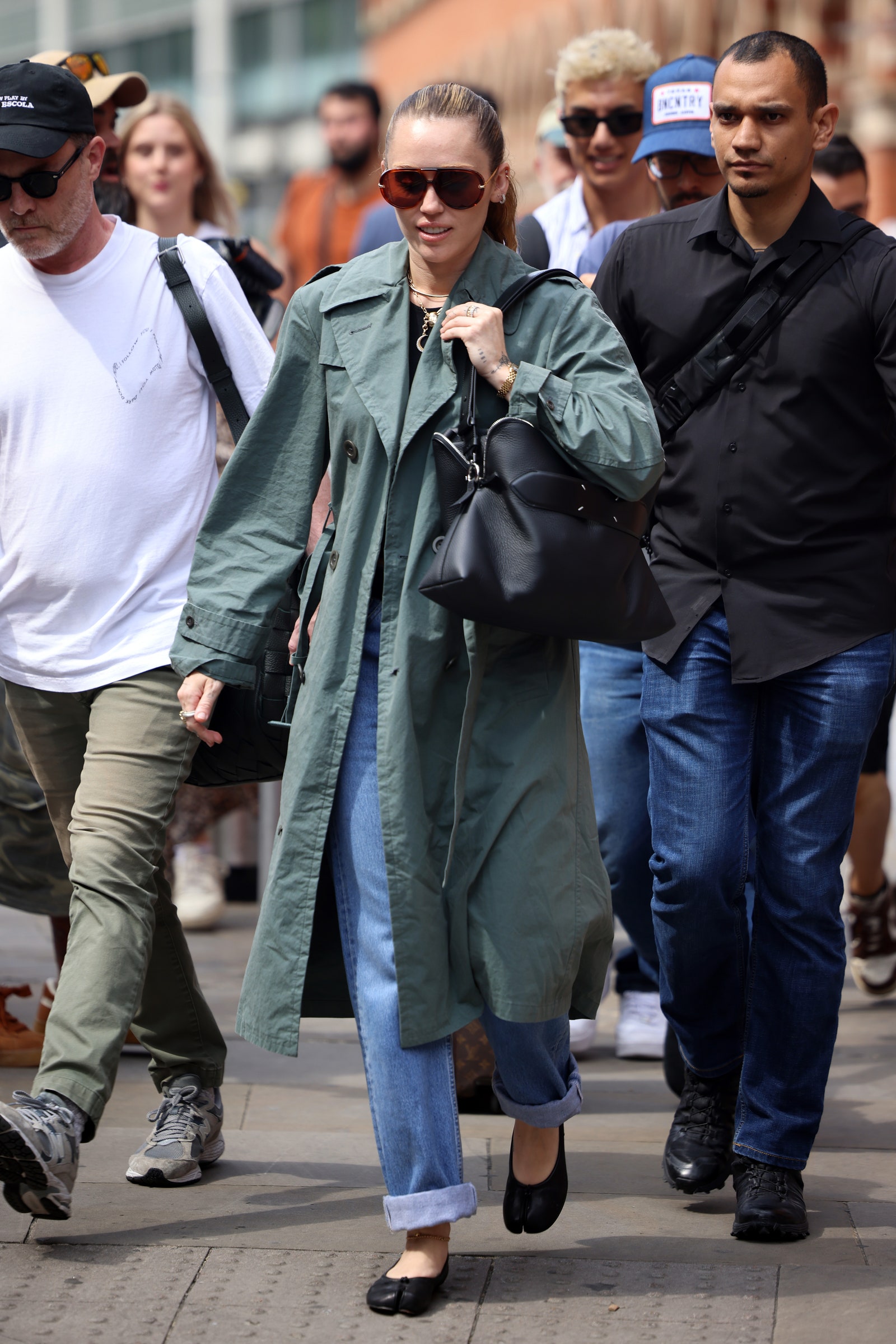 Miley Cyrus arrives at St Pancras International on June 20, 2025 in London