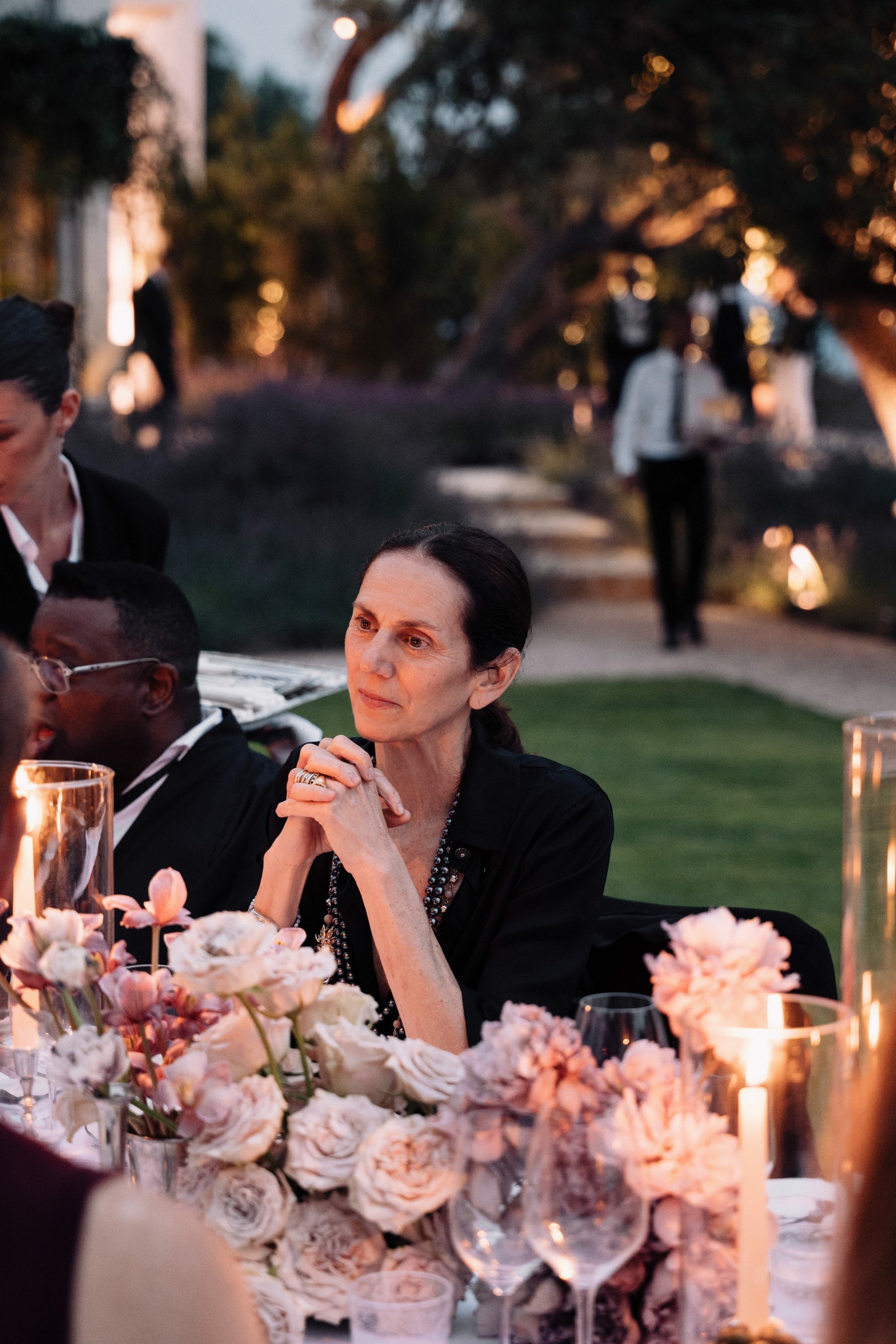 Image may contain Isaac Julien floral arrangement bouquet bouquet plant accessories glass adult and human