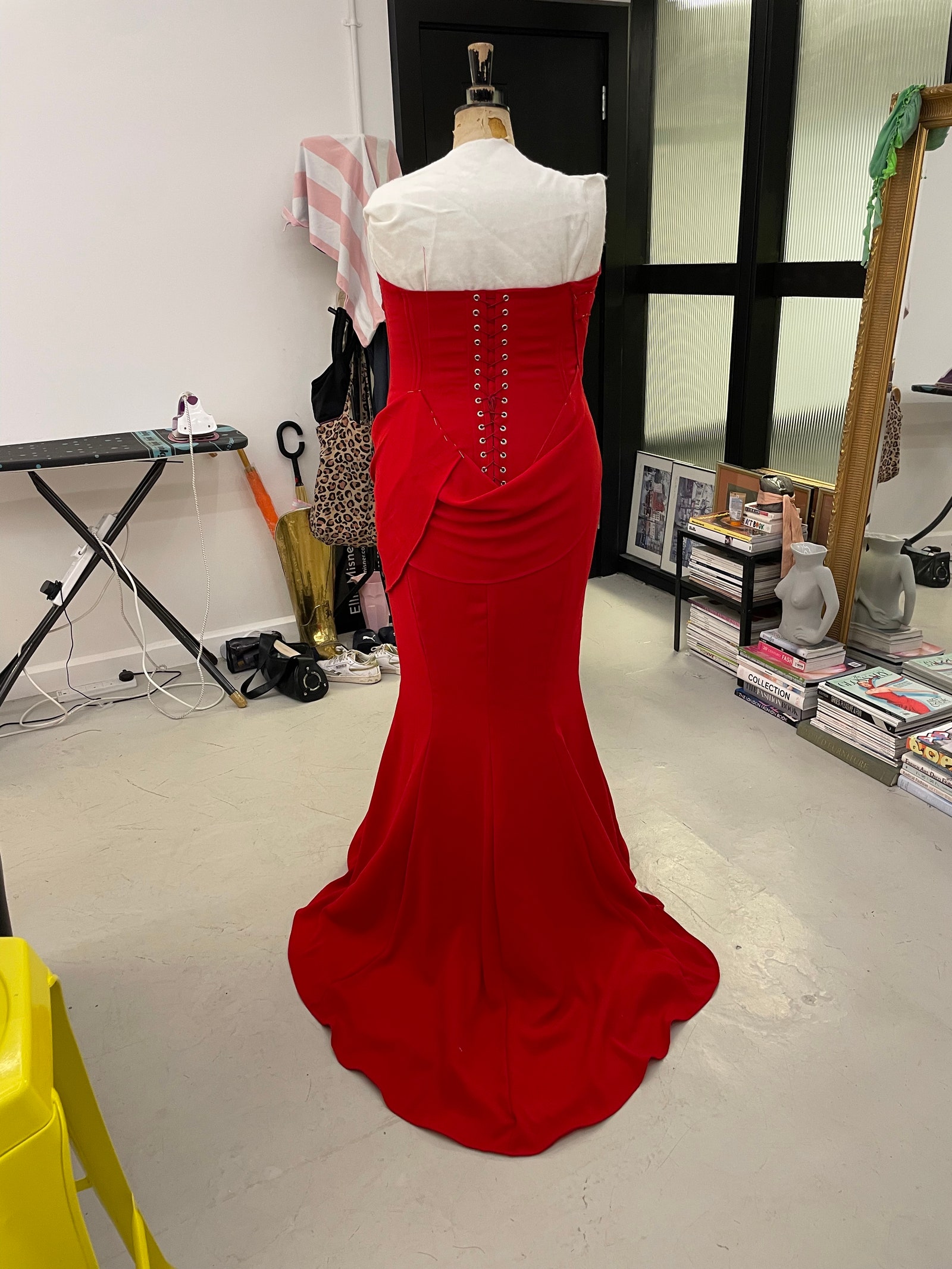 Images may contain clothing dress formally wearing evening dress fashion dress adult wedding accessories and bags