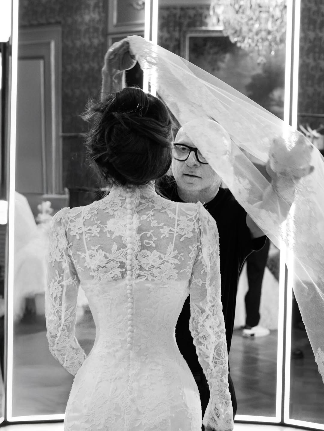 Images may contain Domenico Dolce Clothing Dress Fashion Formal Wedding Dress Wedding Dress Adults and People