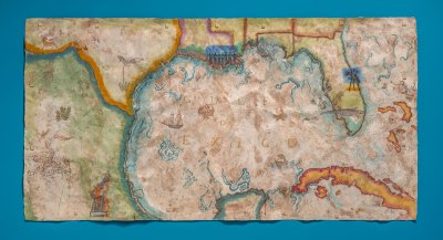 Hand-drawn map of the Gulf of Mexico and surrounding land, surrounded by various animals, ships and life scenes. 