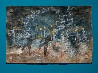 Drawings of two people dancing on the dark night sky background. 