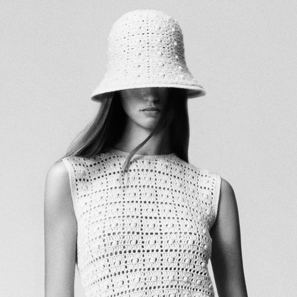 Images may contain clothes, hat, sun hat, adult face and head