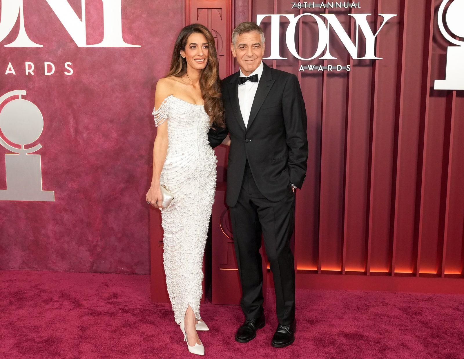 Images may contain George Clooney Amal Clooney Fashion Clothing Footwear High Heels Adults and Accessories