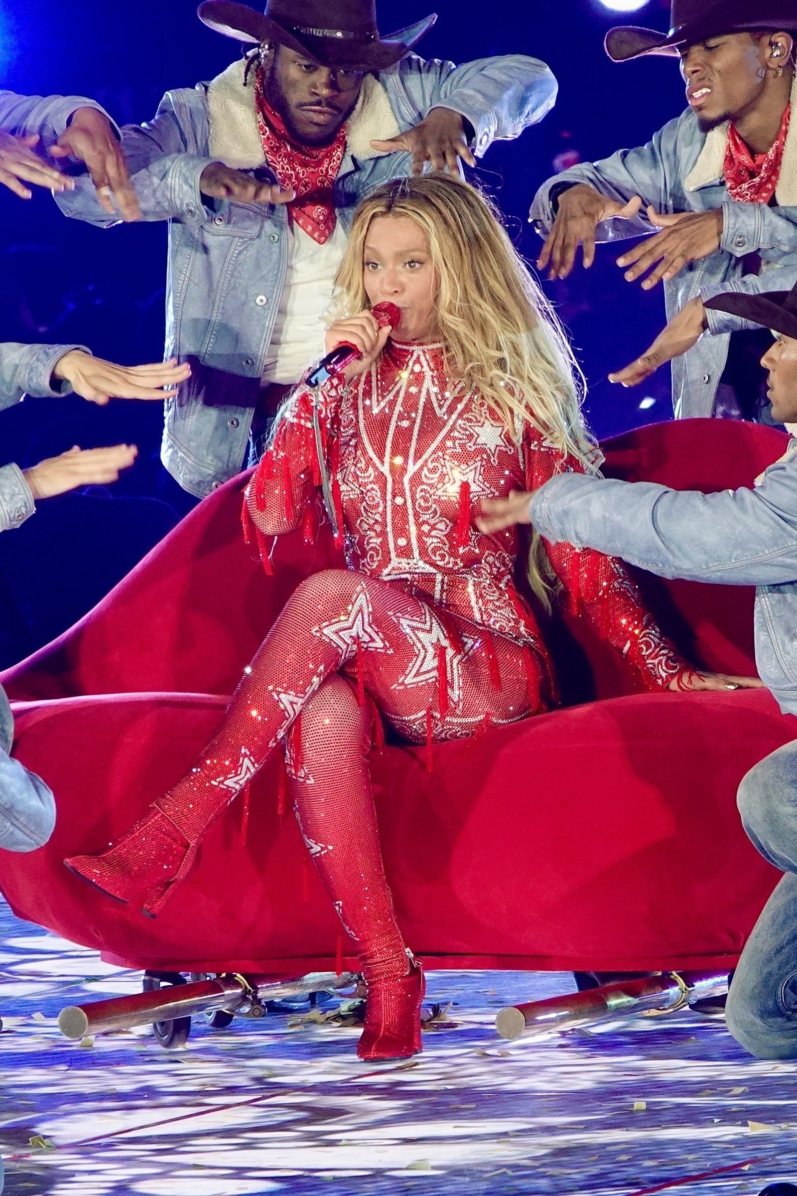 Images may contain Beyoncé black thinking hat group performers adult dance and leisure activities