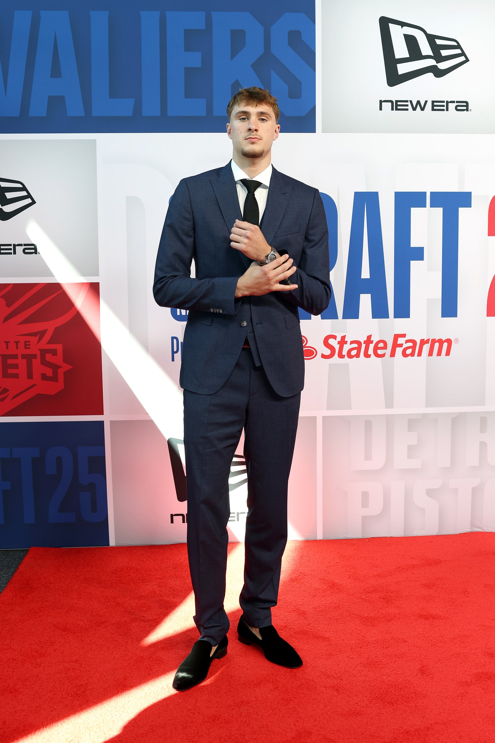 Images may contain clothes formally wearing suits, man standing fashionable adult shoes, shoes accessories and tie