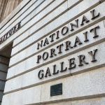 The exterior wall of the building, with text reading 