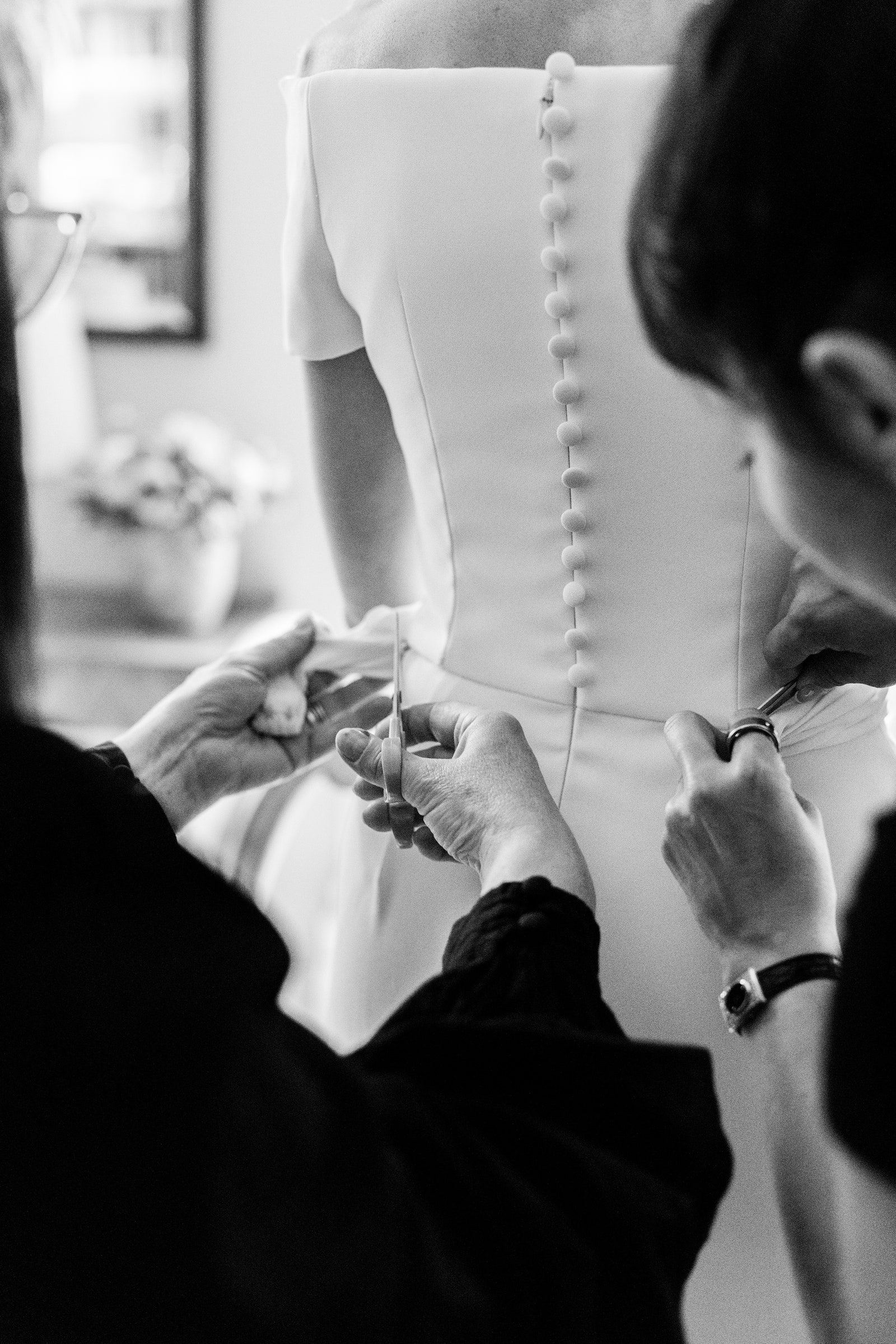 Images may contain body parts fingers manual clothing dress adult fashion formal wear and dress