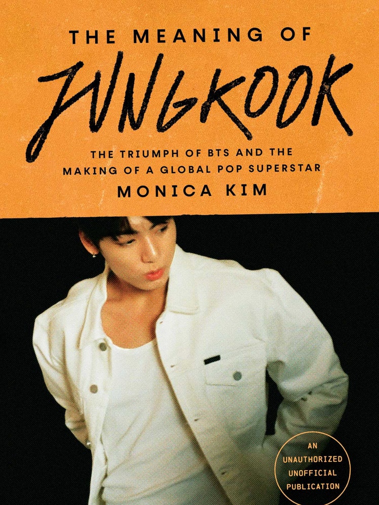 Images may contain: Jungkook, books, publications, novels, clothes, coats, people, faces and heads
