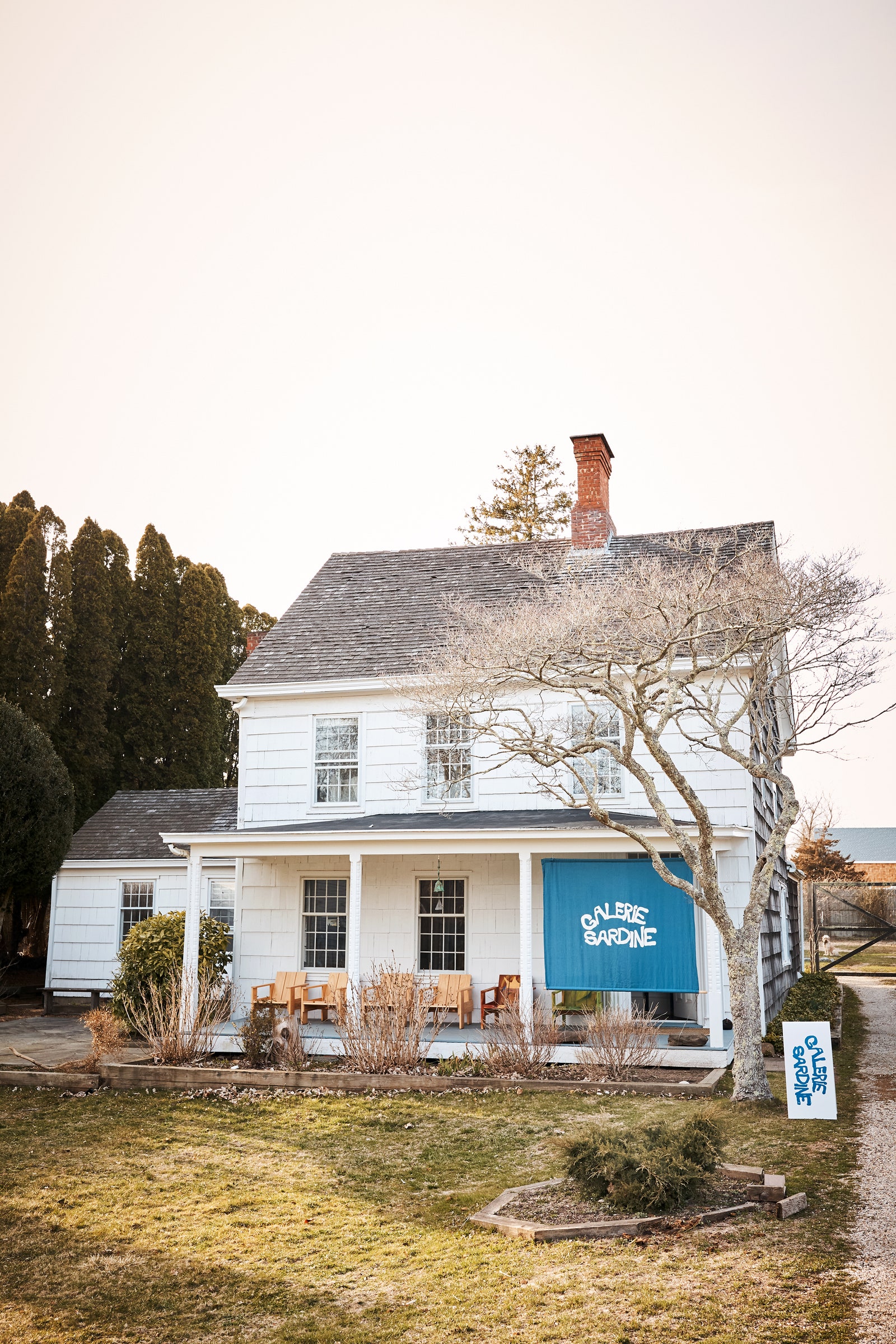 Images may contain chairs, furniture, buildings, outdoor shelter, houses and porches
