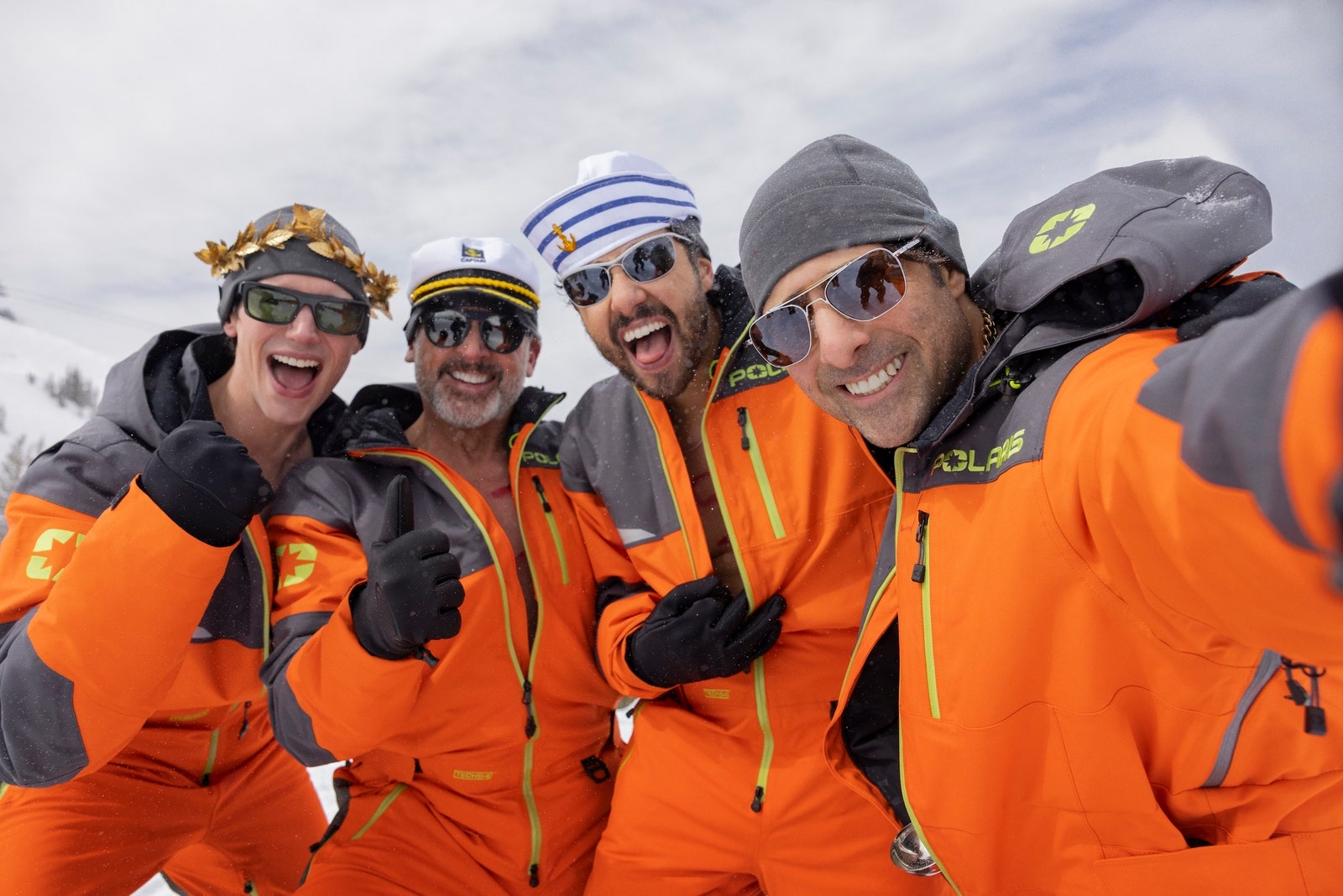 Images may contain Jason Schwartzman Cory Michael Michael Smith Clothing Galed Guard Gace Jacket Accessories Glasses Hat and Adults