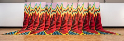 A long weave similar to a colorful mountain range.