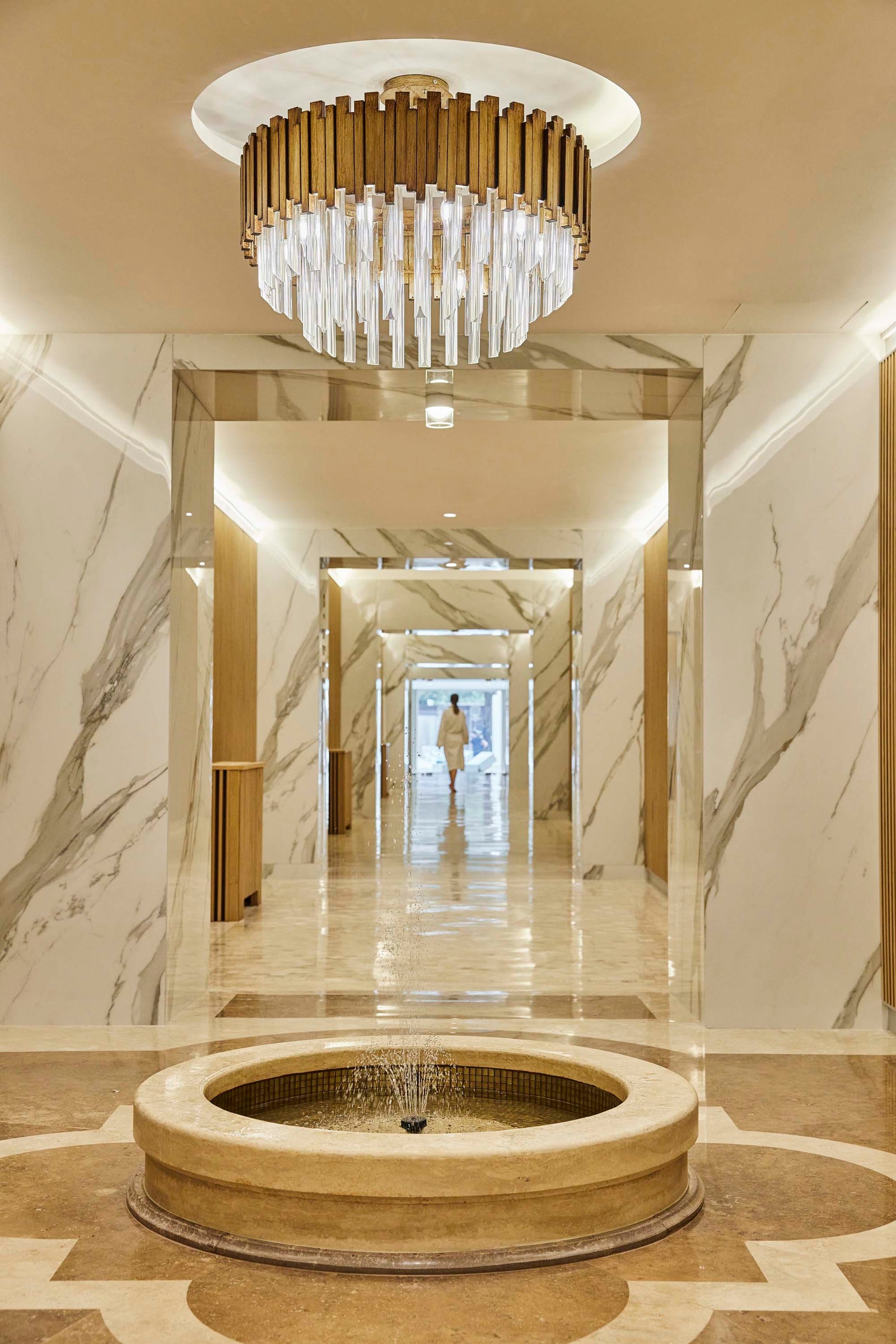 Images may contain flooring interior building building foyer lights and flooring