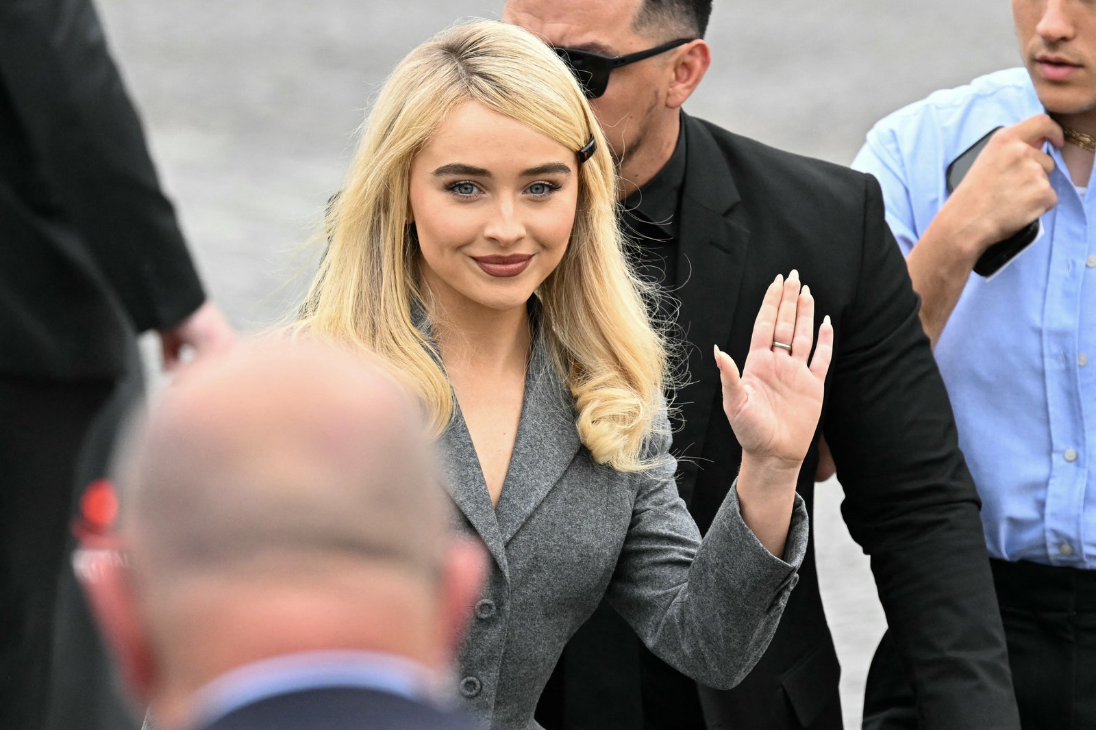 Images may contain Sabrina Carpenter Adult Blonde Head Face Accessories Jewelry Necklace and Glasses