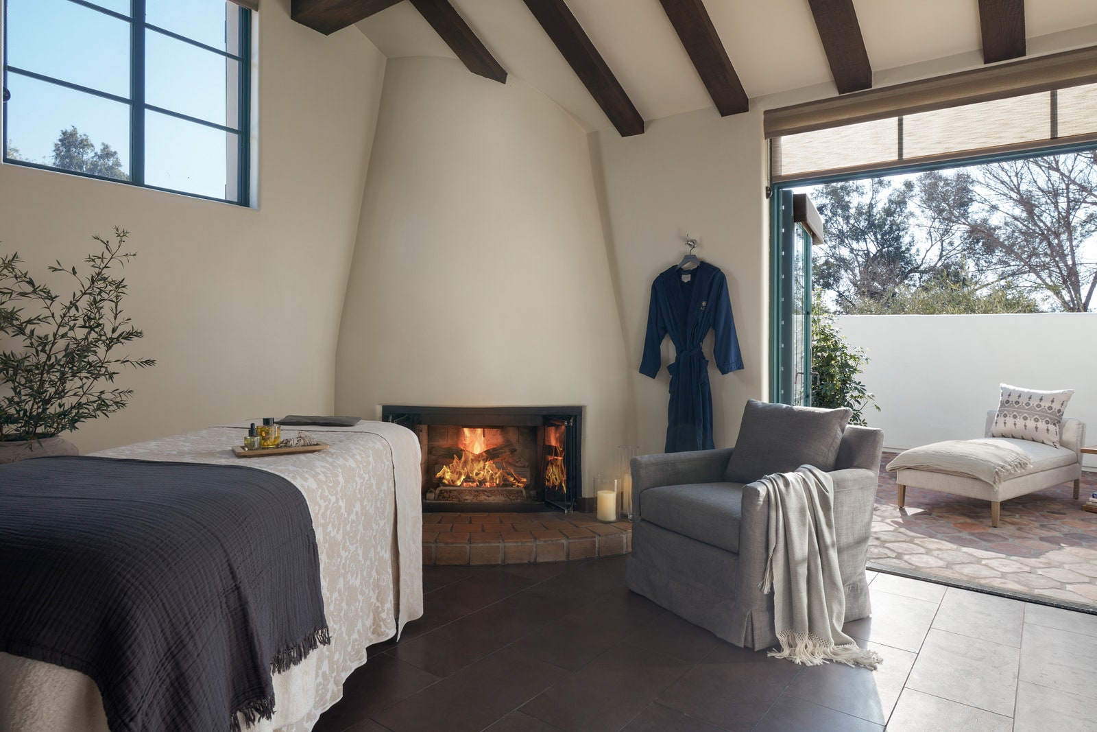 Images may contain fireplace interior bed furniture interior design candle fireplace sofa home decoration and carpet